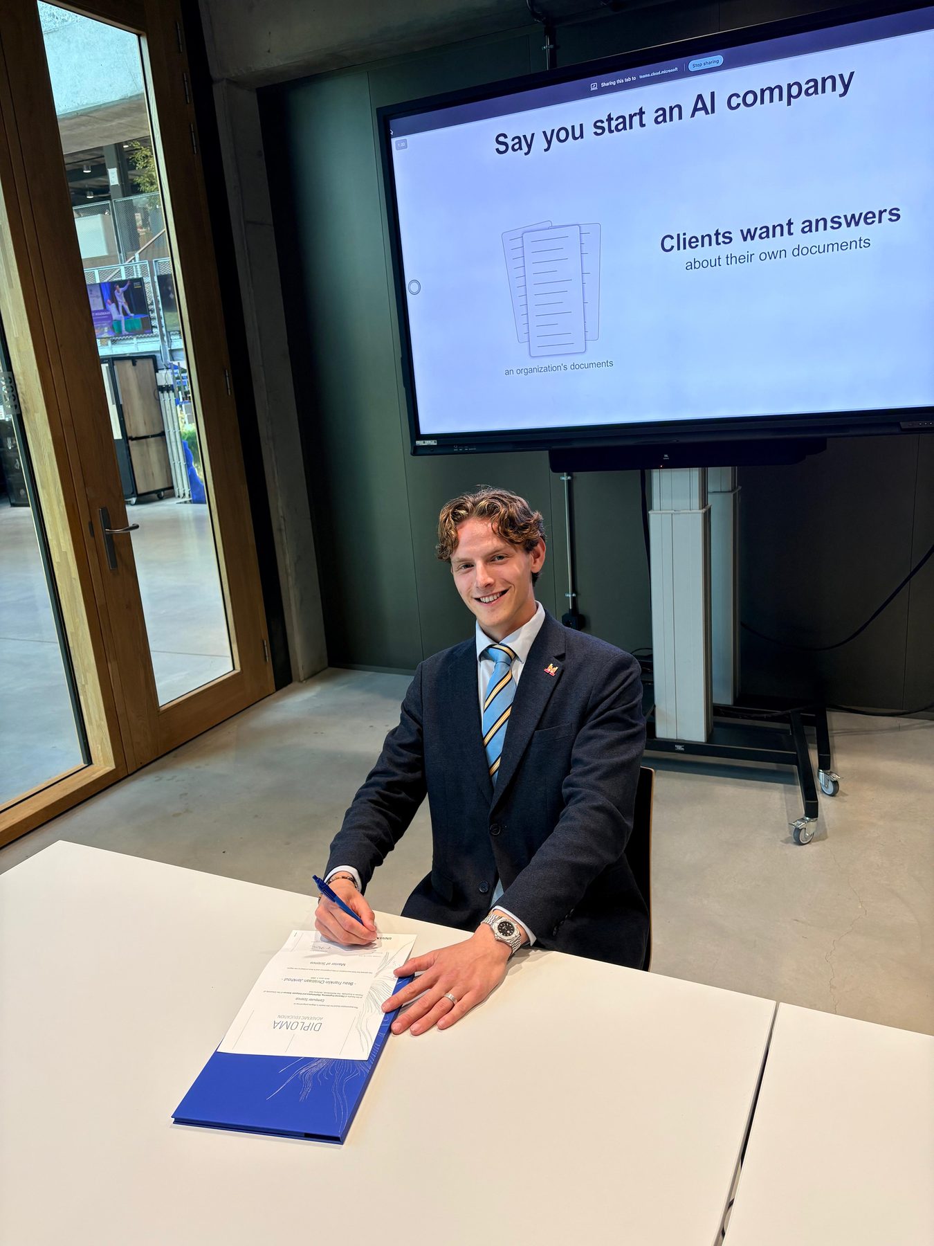 Beau Jonkhout signing the MSc diploma after the defense, University of Twente, 28 August 2026